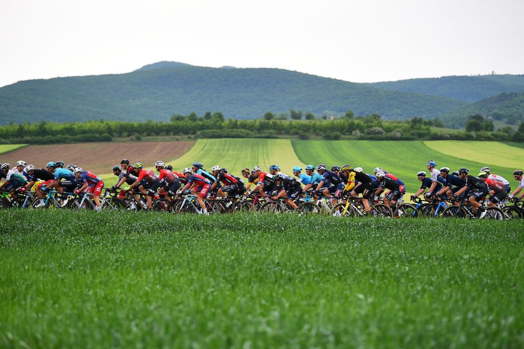 NYIREGYHAZA HUNGARY MAY 13 A general view of the peloton competing during the 43rd Tour de Hongrie 2022 Stage 3 a 154km stage from Sarospatak to Nyiregyhaza tourdehongrie on May 13 2022 in Nyiregyhaza Hungary Photo by Dario BelingheriGetty Images