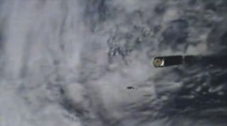 A train of Planet SuperDove Earth observation cubesats is released from an Indian Space Research Organisation Polar Satellite Launch Vehicle rocket after a successful launch on Nov. 27, 2019. The rocket carried 12 SuperDove satellites in all, along with another U.S. cubesat called Meshbed and the larger Cartosat-3 Earth observation satellite.