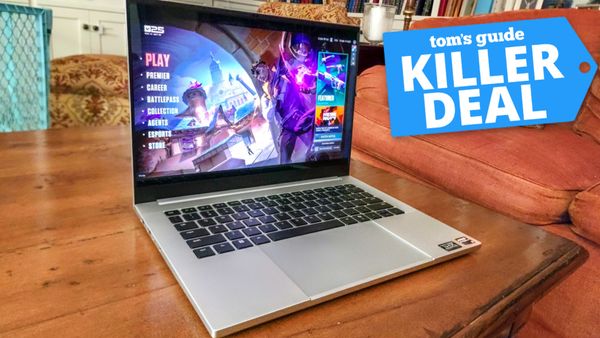 Razer Blade 14 with deal tag superimposed