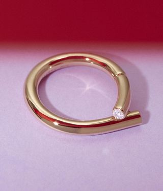 Gold ring by Tabayer.