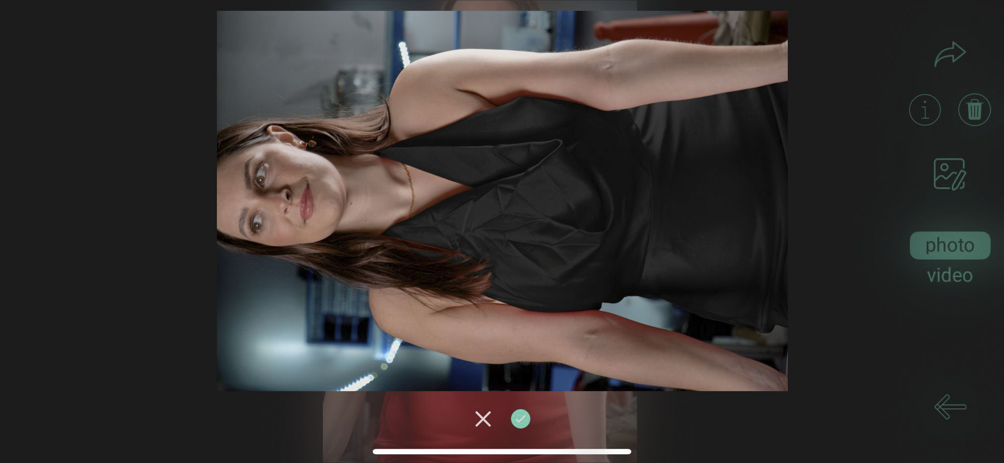 Caira camera user interface with a photo of a lady in a red dress now changed to lady in a black dress