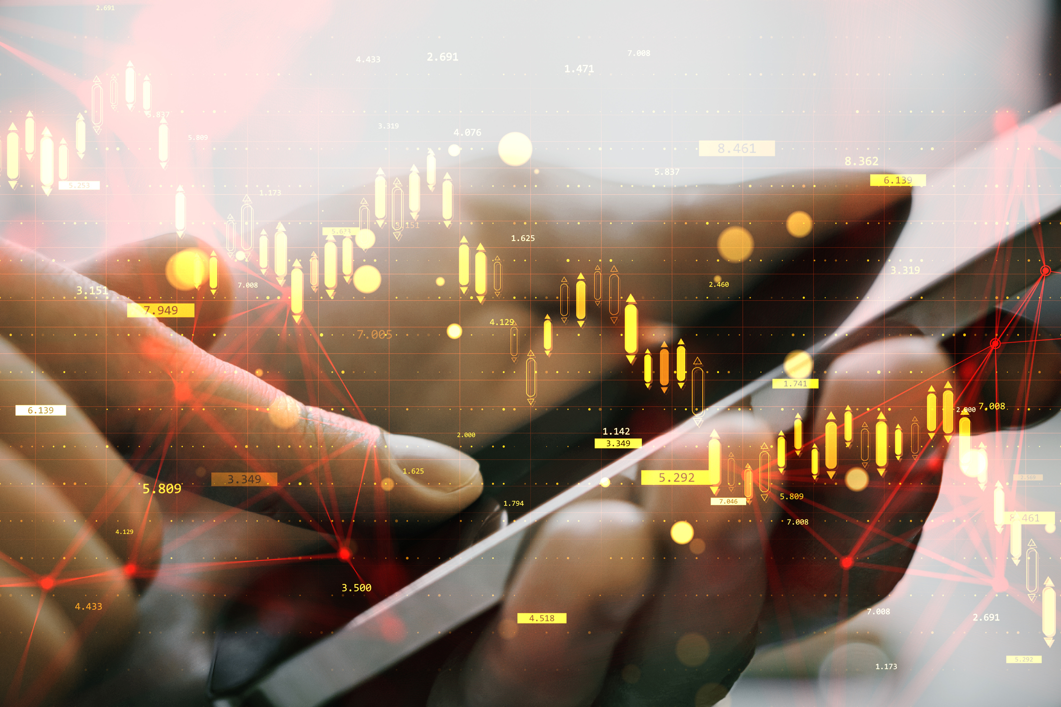 Person using smartphone with financial graph overlay