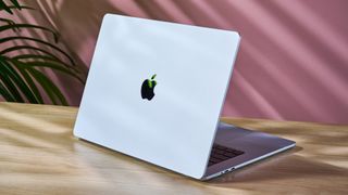 MacBook Air 15-inch with M4 chip on a creative's desk with screen open