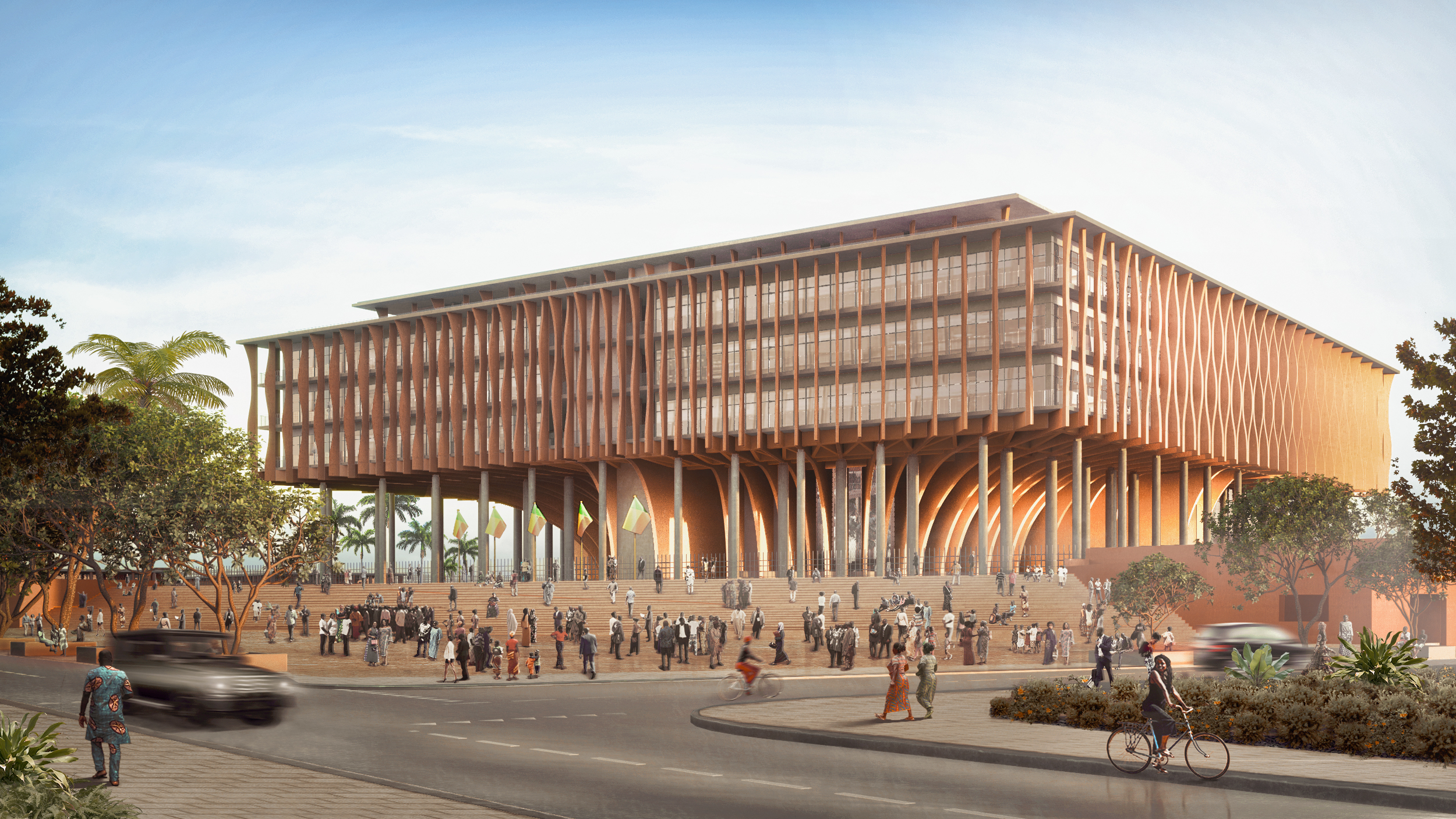A digital image of the exterior view of the grand assembly hall with people all around , photographed from across the road during the day.