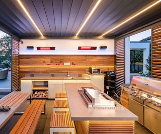 modern integrated outdoor kitchen with grill