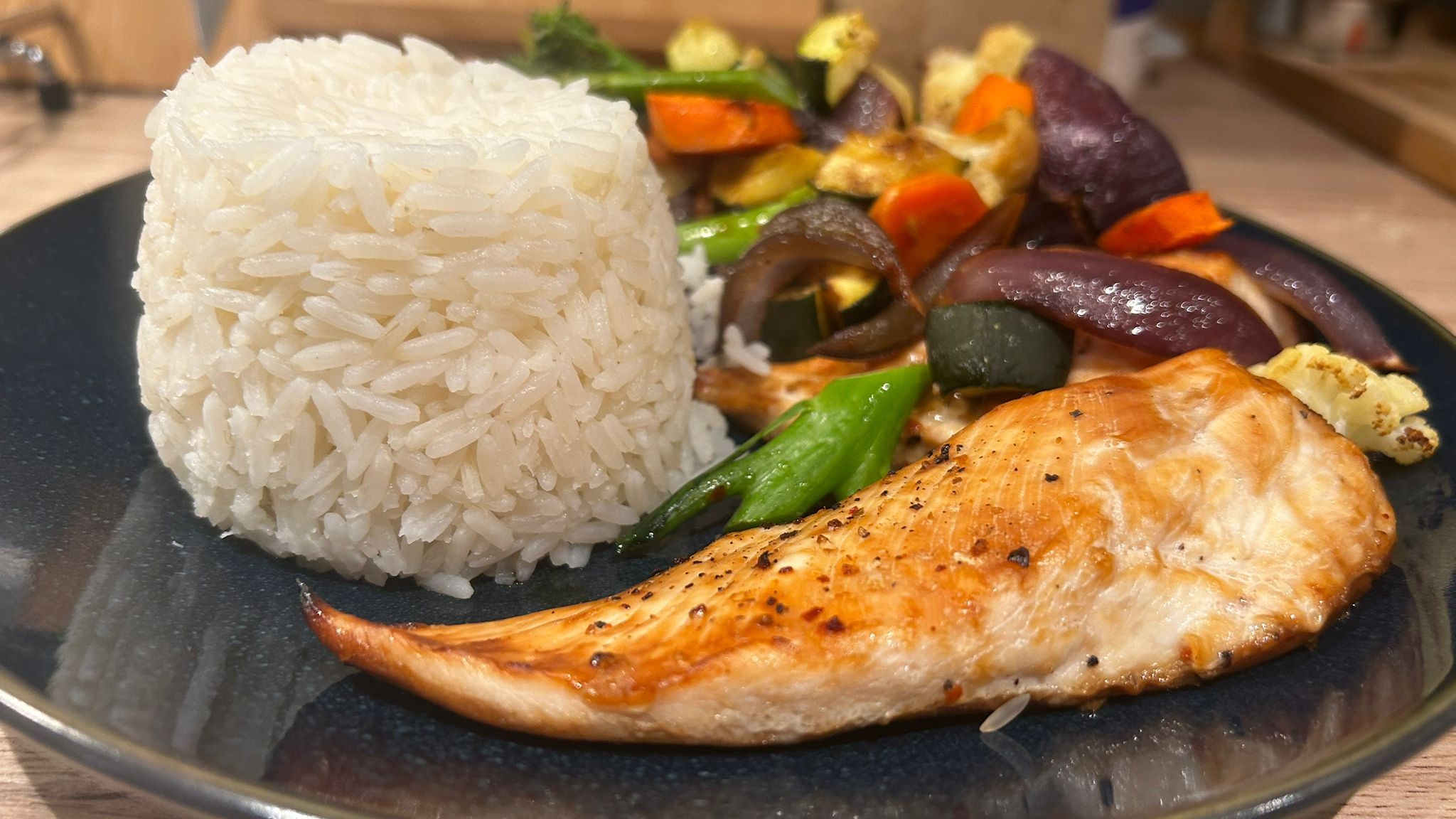 White rice cooked using Ninja Foodi PossibleCooker served with meal