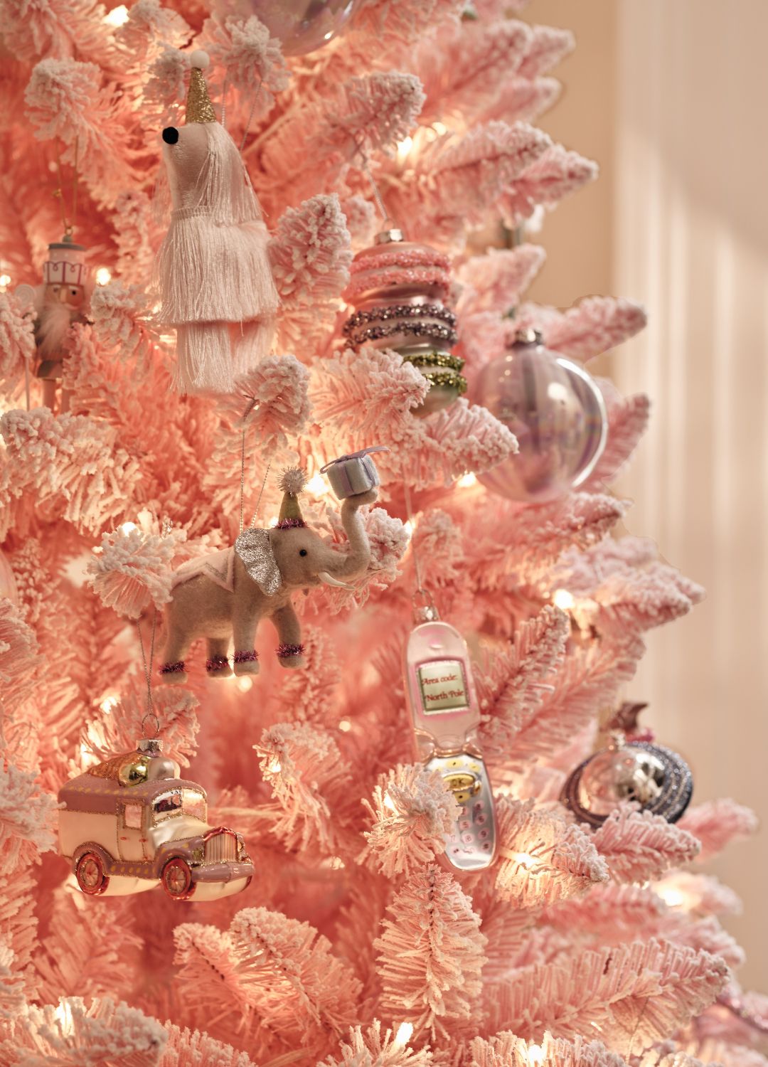 picture of pink tree with decorations on it