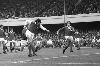 Ray Kennedy shoots towards the Ipswich goal during his time at Arsenal