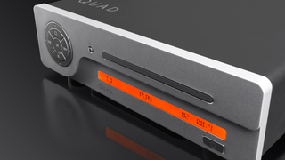 An angled view of the Quad 3CDT on a dark background