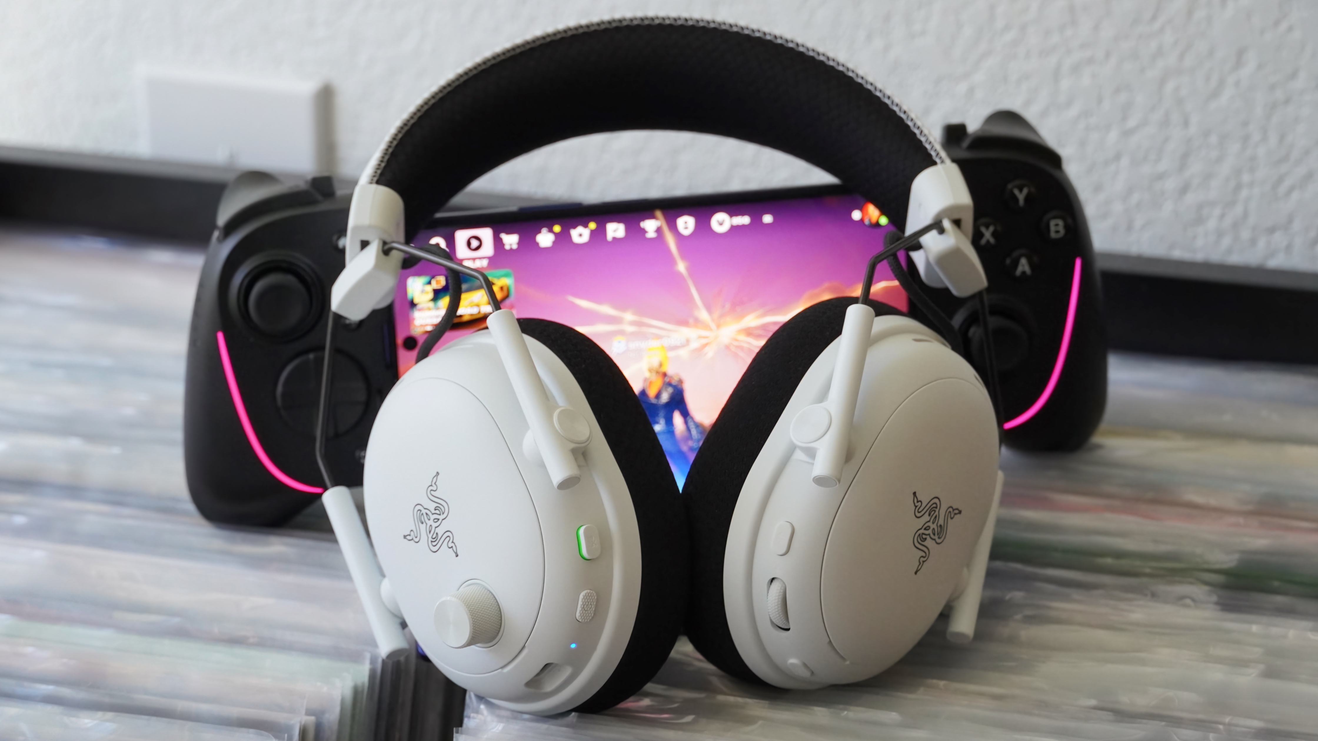 The Razer BlackShark V3 Pro gaming headset laid atop records.