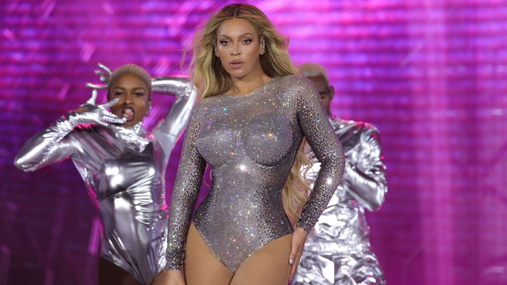 Beyonce performing during the Renaissance Tour in silver