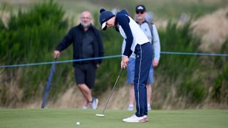 Photo of Esther Henseleit hitting a putt