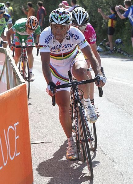 Paolo Bettini begins to reconsider the effort, and decides to sit up and wait for the sprint.
