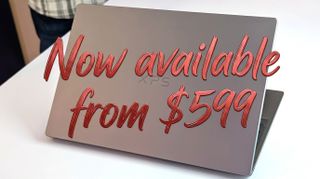 Open XPS 13 laptop with text "Now available from $599" overlaid in red cursive.
