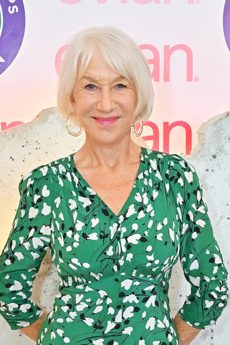 Dame Helen Mirren is pictured with a short bob hairstyle and fringe at the evian 'Mountain Of Youth' VIP Suite during Day 14 of Wimbledon 2025 on July 13, 2025 in London, England.