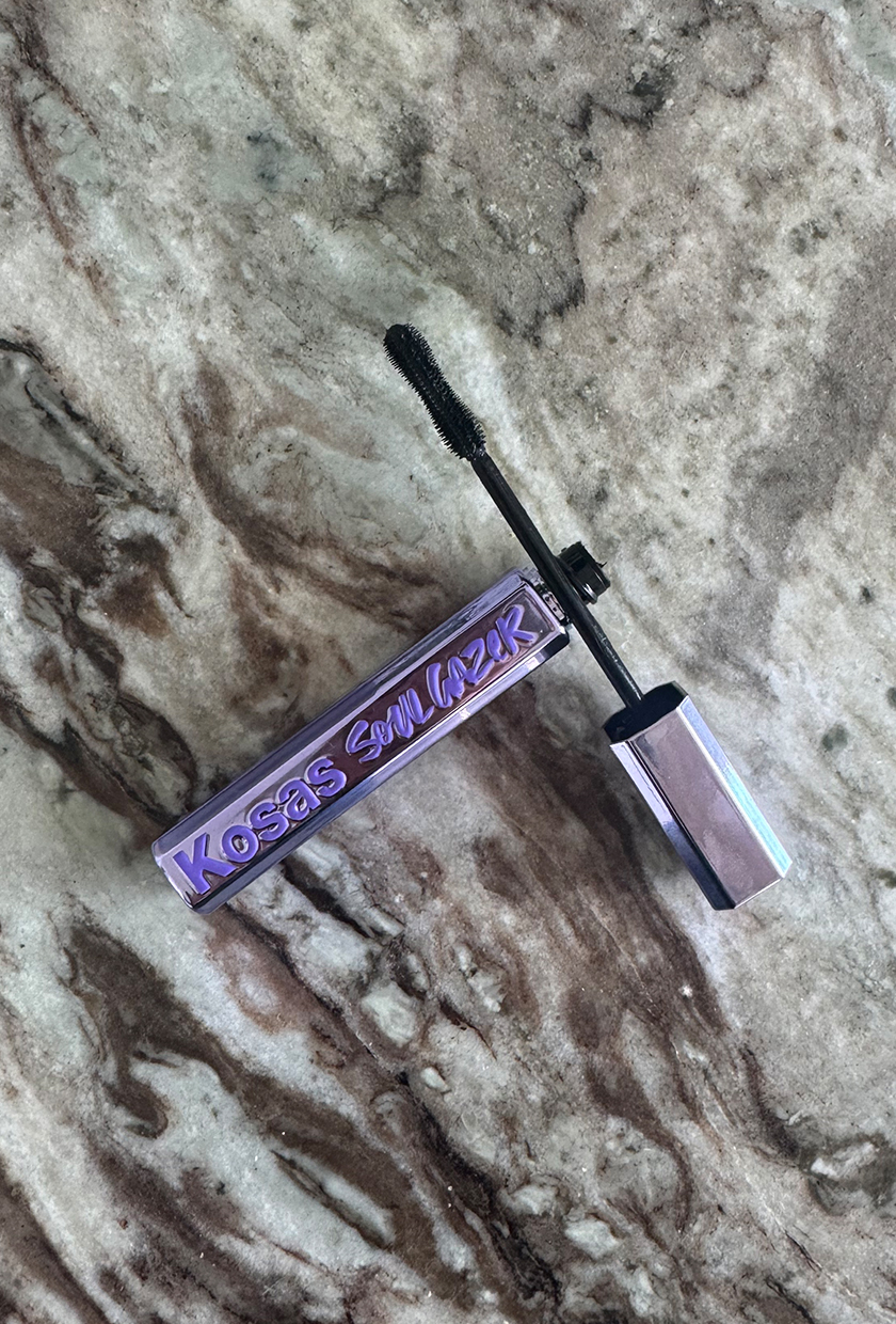 Kosas mascara wand on a marble table