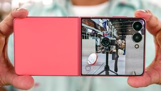 Samsung Galaxy Z Flip 7 held in the hand.