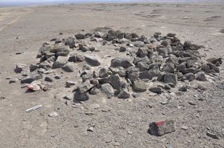 cairns, or rock piles, found near the peru pyramid