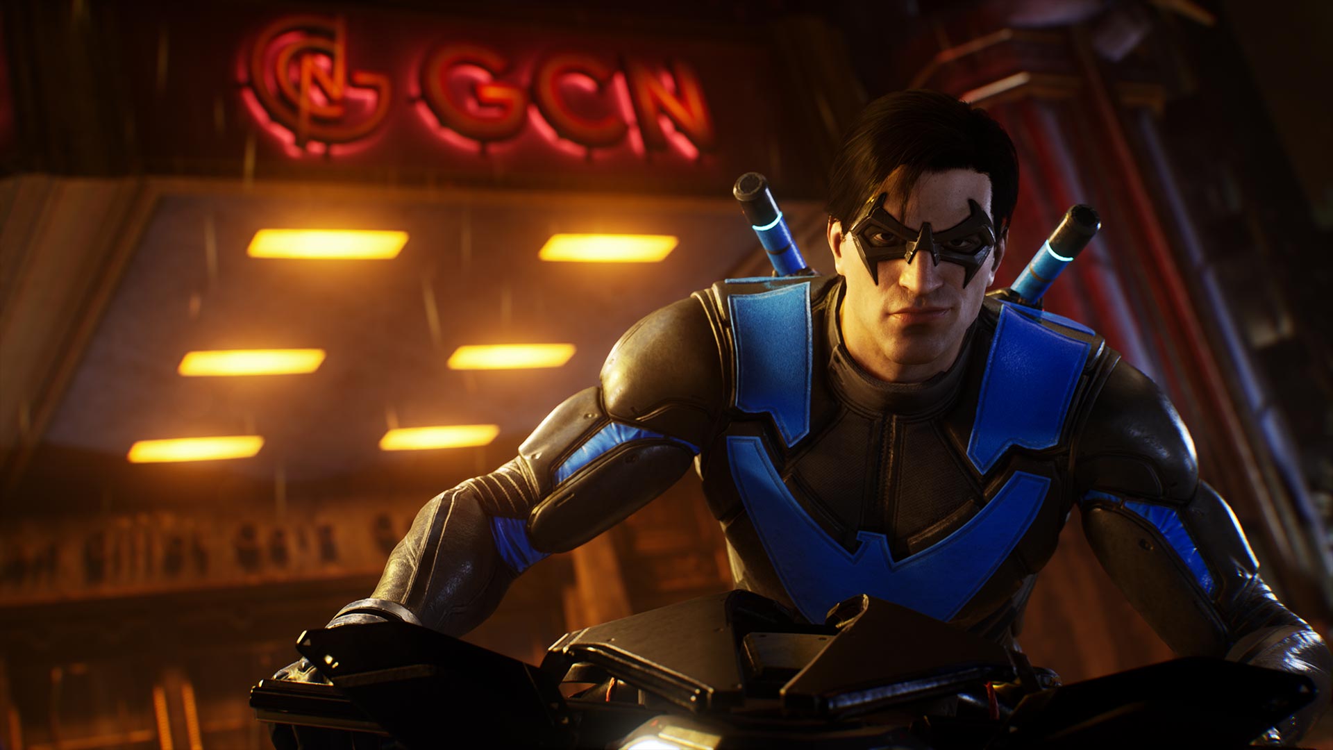Gotham Knights - Nightwing poses in front of Gotham City News with a smirk