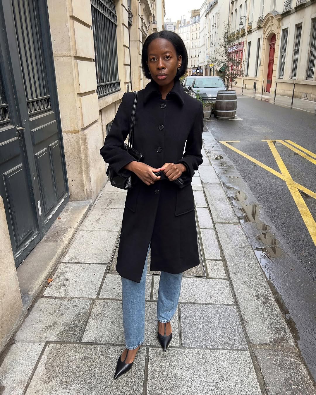 woman wearing winter denim outfit idea 2025