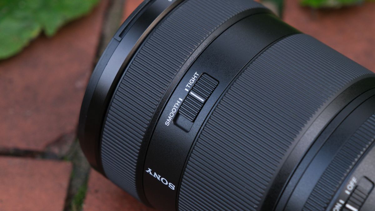 Close-up of the smooth tight switch on a Sony FE 28-70mm f/2 GM lens