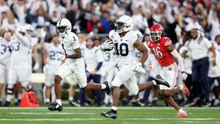Nicholas Singleton #10 of the Penn State Nittany Lions runs with the ball to score a 87 yard touchdown against the Utah Utes during the third quarter in the 2023 Rose Bowl Game at Rose Bowl Stadium on January 02, 2023 in Pasadena, California.