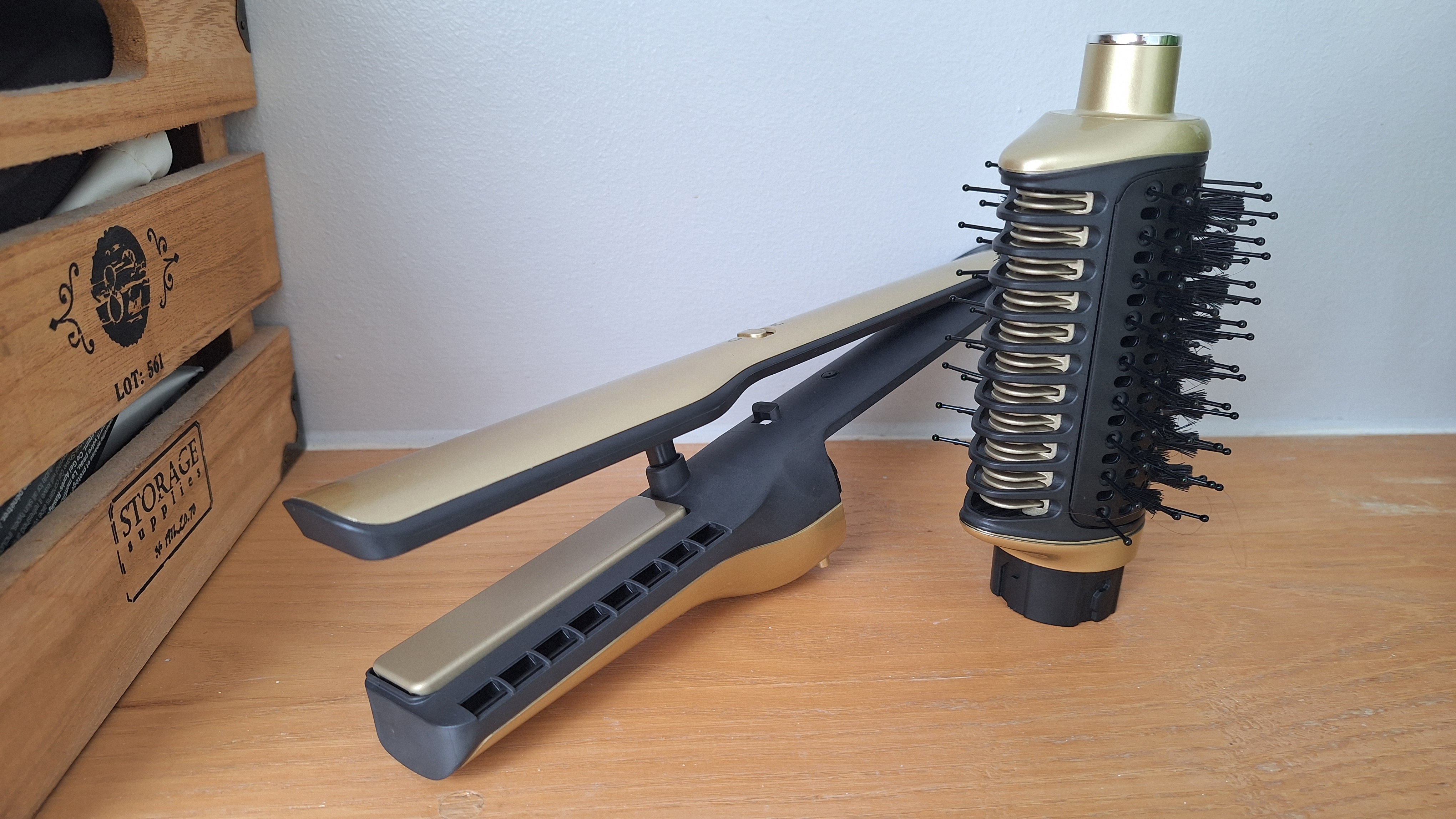 Shark Glossi and Silki attachments for the Glam multi-styler, on a shelf in tester&#039;s bathroom