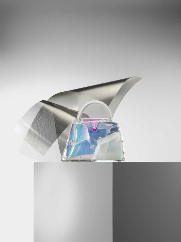 Louis Vuitton x Frank Gehry Limited-Edition Handbag Collection's coinciding exhibition boasts gigantic fish-shaped sculptures and similarly inspired bags in a stunning presentation.