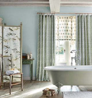 Sanderson curtains and divider screen in a traditional bathroom