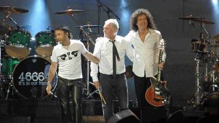 Queen and Paul Rodgers performing onstage in 2009