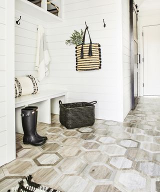 A mudroom with wood-effect porcelain floors in an octagonal pattern