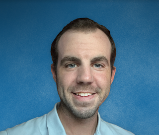 Smiling headshot of Luke Bailey