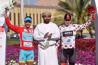 The jersey wearers on the Oman podium