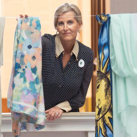 Duchess Sophie hanging up a scarf on a clothes line at a memorial 