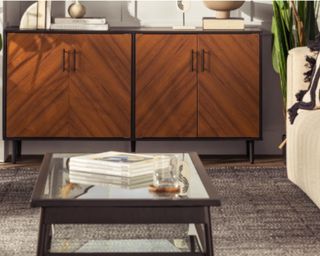 Walker Edison mid-century modern buffet in living room with wooden-glass coffee table and brown rug