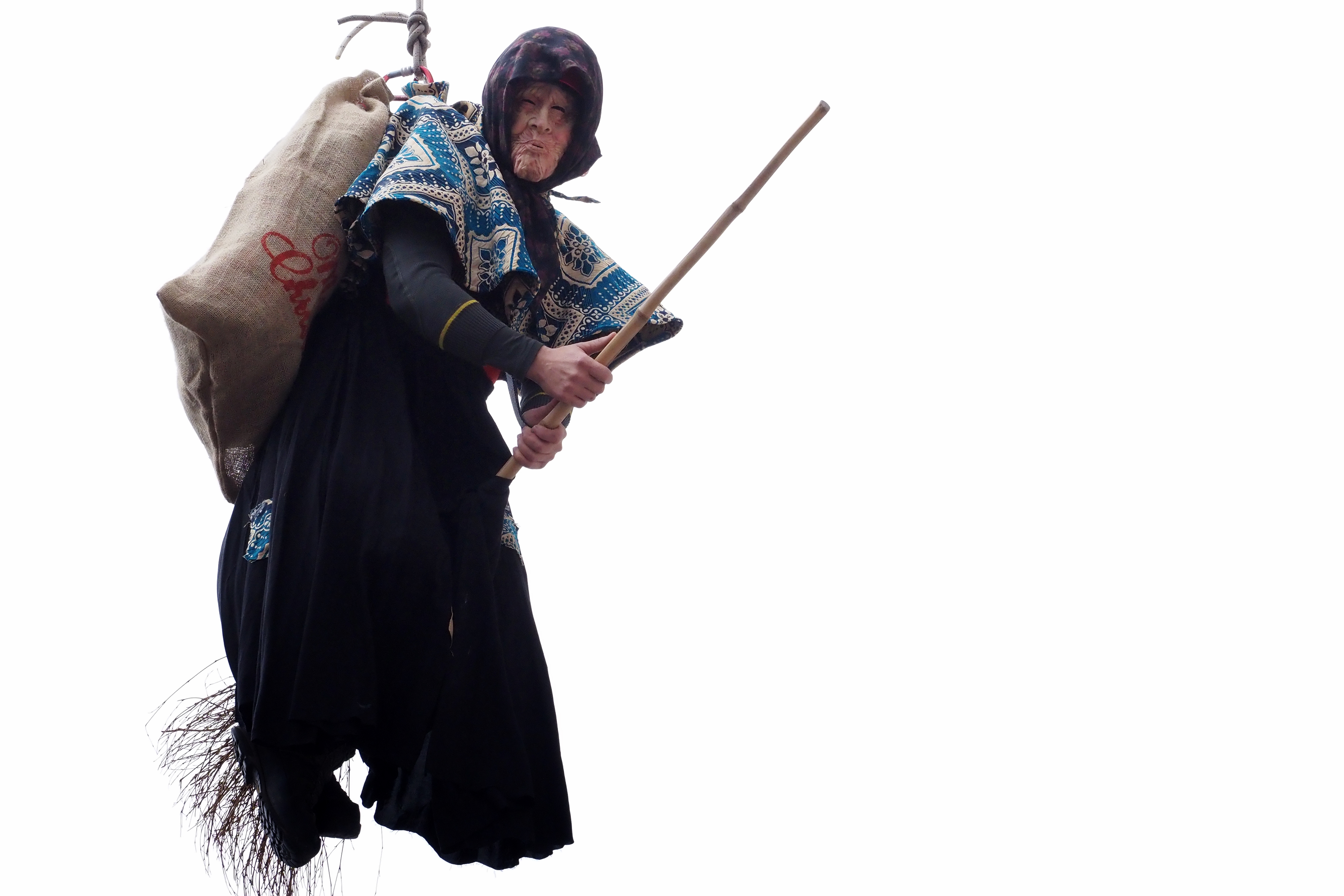 CASERTA, ITALY - 2024/01/06: A firefighter disguised as Befana lowers himself from the fa&amp;ccedil;ade of the Royal Palace of Caserta, giving sweets and candies to all the children, for the closing of the Christmas holidays. (Photo by Vincenzo Izzo/LightRocket via Getty Images)