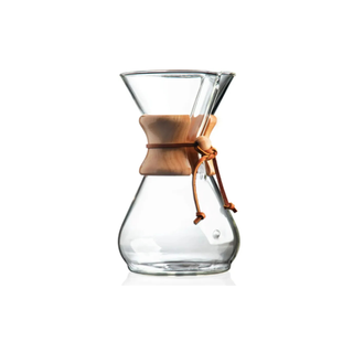 A Chemex pour-over coffee maker against a white background