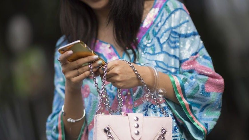 Woman Texting on Phone