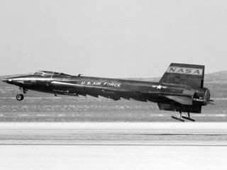 The North American X-15 settles to the lakebed after a research flight from what is now the NASA Dryden Flight Research Center, Edwards, Calif.