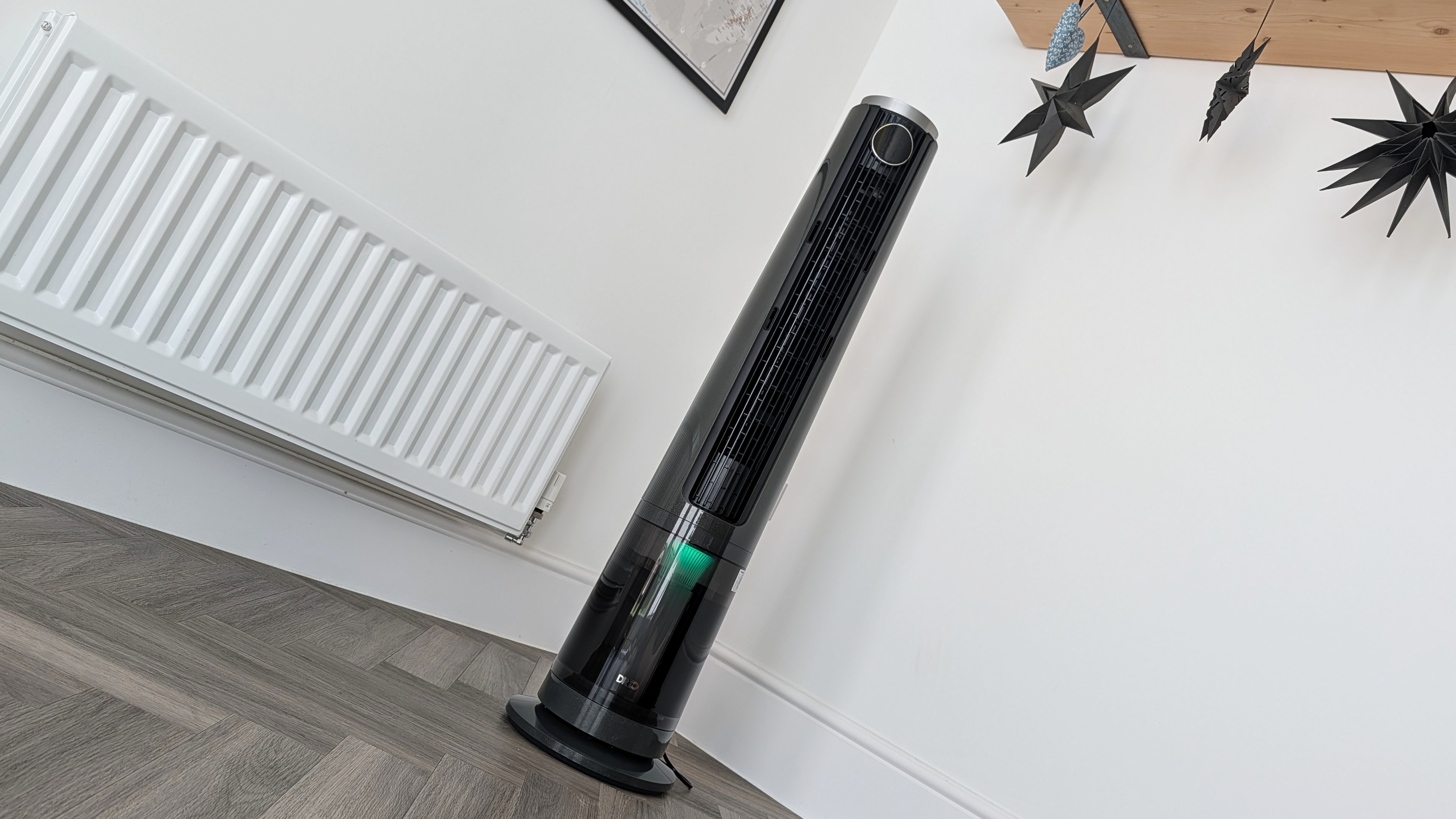 The Dreo Smart Misting Fan 765S in the corner of a room.