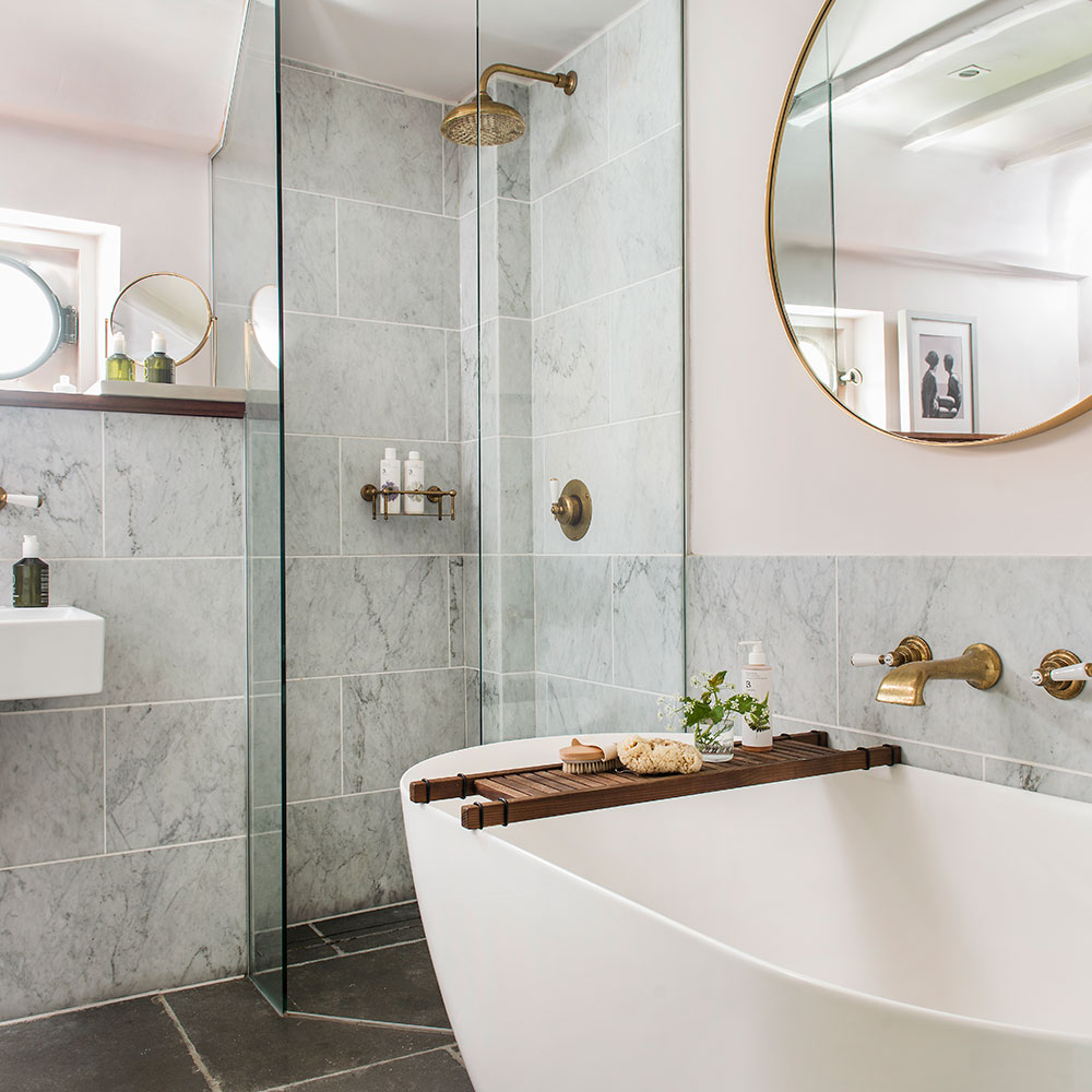 bathroom with mirror and shower glass door