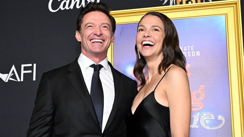 Hugh Jackman and Sutton Foster standing together and smiling at the AFI Fest 2025 Closing Night Premiere of &quot;Song Sung Blue&quot; held at the TCL Chinese Theatre on October 26, 2025 in Los Angeles, California.
