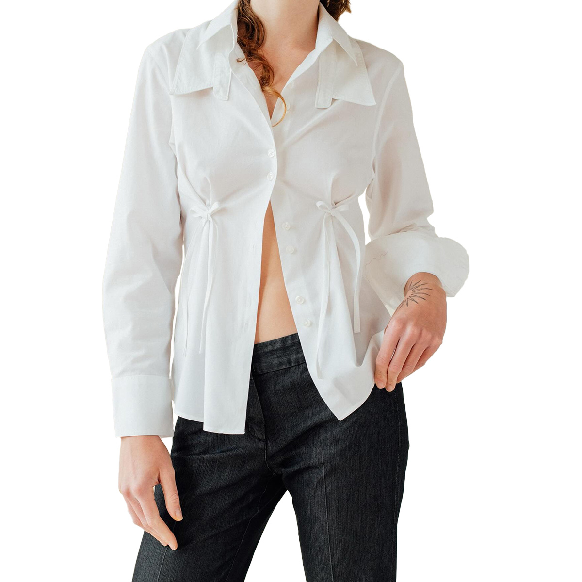 White button-down shirt with bow detailing.