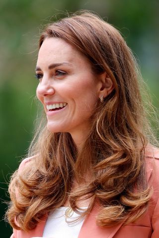 Kate Middleton headshot with a curly ends hairstyle