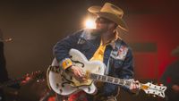 Orville Peck performing with his Gretsch Limited Edition Orville Peck Falcon