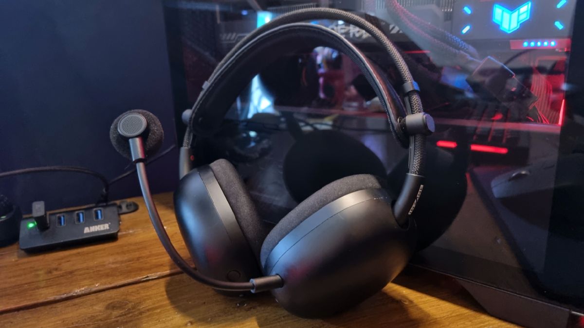 The Sony Inzone H9 II gaming headset resting up against a gaming PC