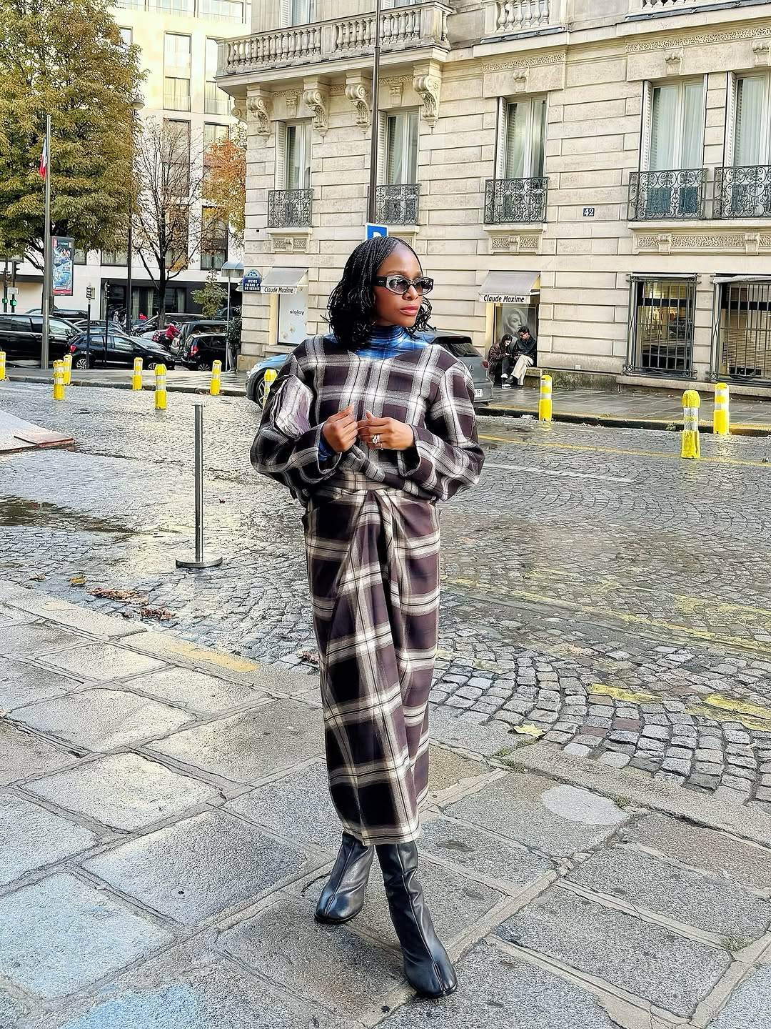 woman wearing plaid maxi skirt outfit 2025