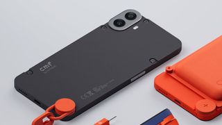 Nothing CMF Phone 1 in black with orange strap