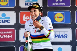 WEVELGEM BELGIUM MARCH 27 Elisa Balsamo of Italy and Team Trek Segafredo celebrates winning the race on the podium ceremony after the 11th GentWevelgem In Flanders Fields 2022 Womens Elite a 159km one day race from Ypres to Wevelgem GWEwomen UCIWWT on March 27 2022 in Wevelgem Belgium Photo by Luc ClaessenGetty Images