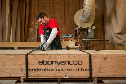 Woodworker Frank Peck unloading the crates